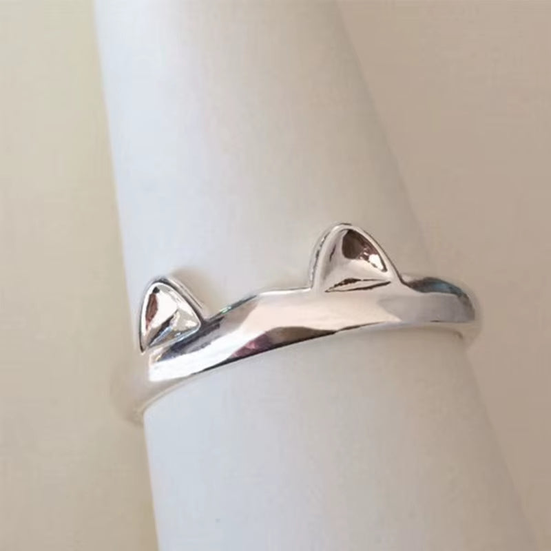 Fine silver cat ear ring close-up